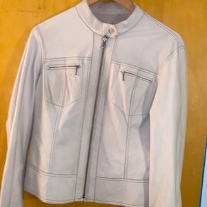 June reversible tan leather jacket, with both suede and leather textures.